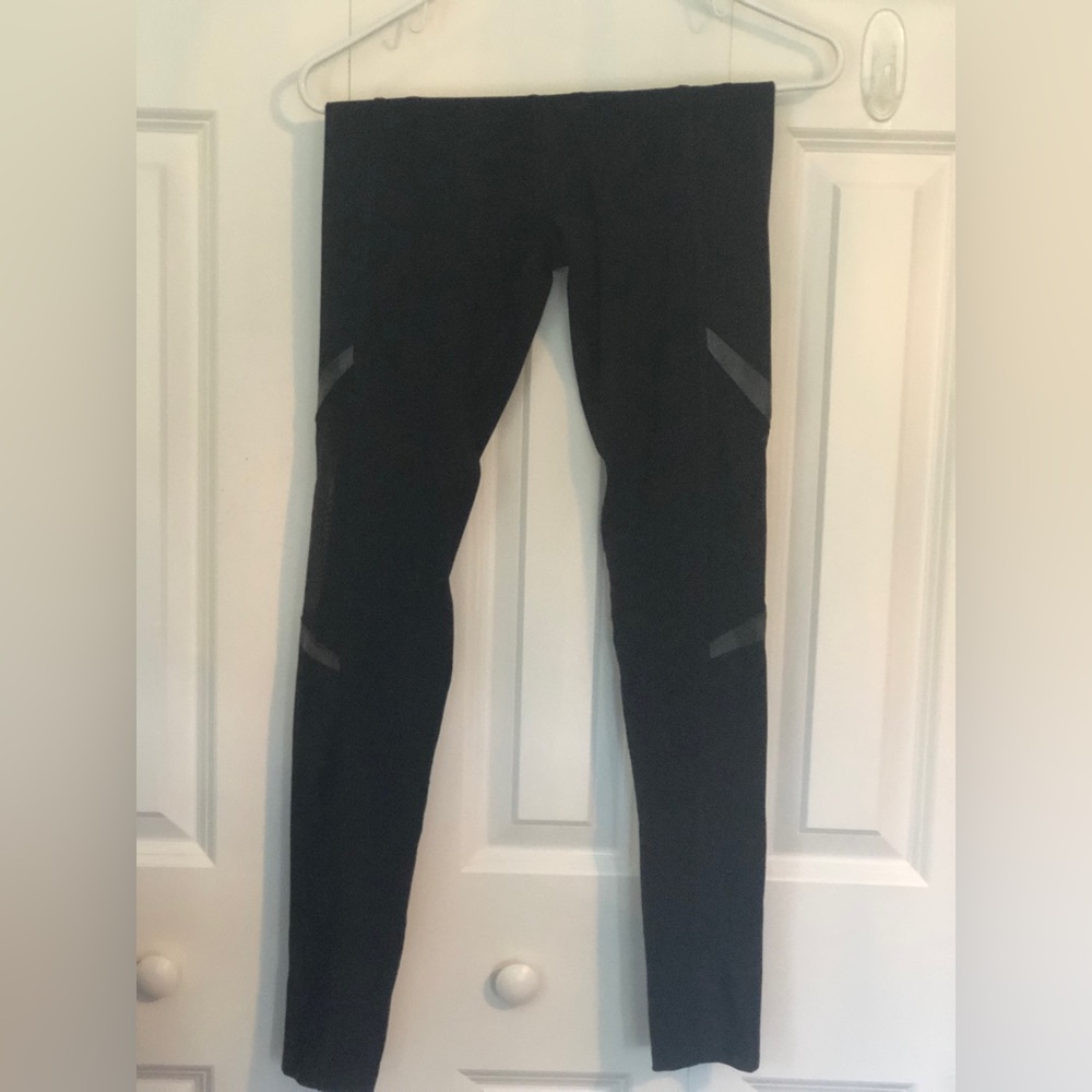Pink ultimate leggings. Black and iridescent. Size XS but is good size s too.